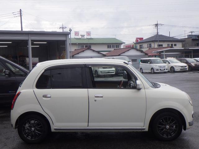 ミラジーノ プレミアムＸ　１年保証付　純正オーディオ　ＣＤ再生　ラジオ　電動格納ミラー　フォグランプ　バニティミラー　社外アルミホイール　パワーウィンドウ　ウィンカーミラー　ヘッドライトレベライザー　運転席・助手席エアバッグ（7枚目）