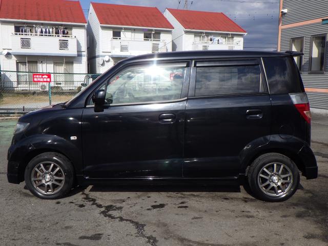 ゼスト スポーツGターボ 1年保証付 ETC 純正オーディオ CD再生 ラジオ HIDヘッドライト キーレスエントリー 社外アルミホイール 電動格納ミラー バニティミラー ベンチシート エアコン 運転席・助手席エアバッグ(11枚目)