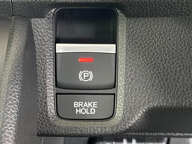 N-ONE プレミアムツアラー 保証2年 ターボエンジン カーテンエアバック 記録簿 LEDランプ クルコン 前席シートヒーター ETC Wエアバッグ フルオートエアコン エアバック DVD ABS パワステ パワーウインドウ(25枚目)