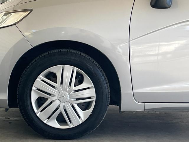 フィット １３Ｇ・Ｌホンダセンシング　保証１年付き　地デジフルセグＴＶ　ＥＴＣ車載器　ＤＶＤ再生可　ナビ＆ＴＶ　サイドカーテンエアバック　Ｄレコ　ＵＳＢ　リアカメラ　エアバック　パワーウインドウ　記録簿　キーフリーシステム　ＬＥＤライト（54枚目）