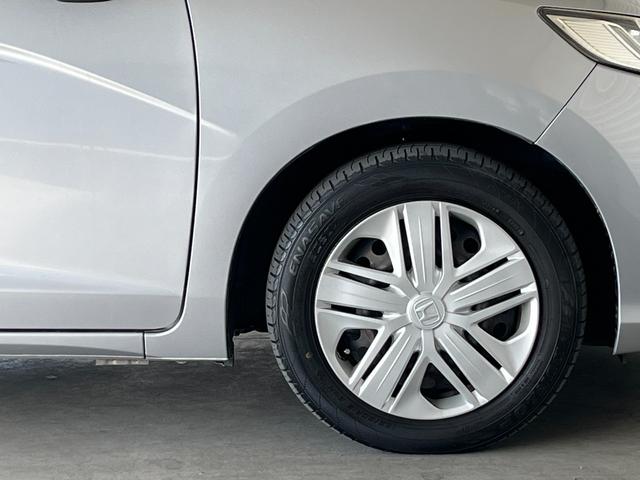 フィット １３Ｇ・Ｌホンダセンシング　保証１年付き　地デジフルセグＴＶ　ＥＴＣ車載器　ＤＶＤ再生可　ナビ＆ＴＶ　サイドカーテンエアバック　Ｄレコ　ＵＳＢ　リアカメラ　エアバック　パワーウインドウ　記録簿　キーフリーシステム　ＬＥＤライト（57枚目）