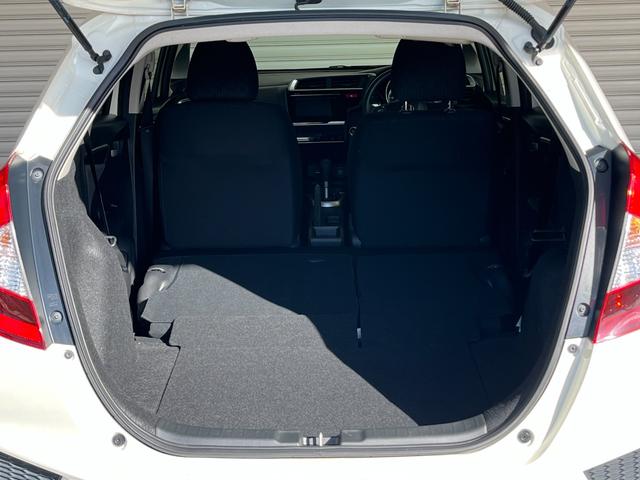 フィット １３Ｇ・Ｆパッケージ　保証付き１年　イモビ　ＤＶＤ再生可能　スマ－トキ－　記録簿有り　ＶＳＡ　ＥＴＣ付き　助手席エアバッグ　Ｒカメラ　オートエアコン　ＵＳＢ接続　エアバック　ＰＳ　キ－フリ－　１セグ　ＰＷ　ＡＢＳ　ＴＶナビ（39枚目）