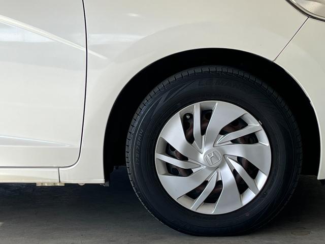 フィット １３Ｇ・Ｆパッケージ　保証付き１年　イモビ　ＤＶＤ再生可能　スマ－トキ－　記録簿有り　ＶＳＡ　ＥＴＣ付き　助手席エアバッグ　Ｒカメラ　オートエアコン　ＵＳＢ接続　エアバック　ＰＳ　キ－フリ－　１セグ　ＰＷ　ＡＢＳ　ＴＶナビ（53枚目）