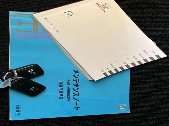 フィット １３Ｇ・Ｆパッケージ　保証付き１年　イモビ　ＤＶＤ再生可能　スマ－トキ－　記録簿有り　ＶＳＡ　ＥＴＣ付き　助手席エアバッグ　Ｒカメラ　オートエアコン　ＵＳＢ接続　エアバック　ＰＳ　キ－フリ－　１セグ　ＰＷ　ＡＢＳ　ＴＶナビ（54枚目）