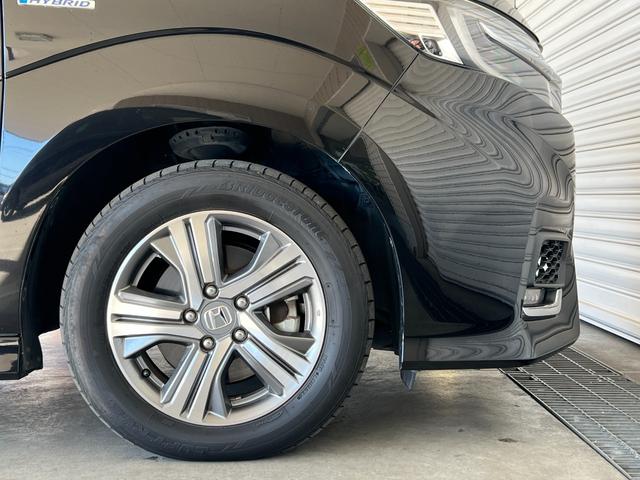 ステップワゴンスパーダ スパーダハイブリッドG・EXホンダセンシング 保証付き1年 フルオートエアコン キーフリー Sヒーター 横滑防止 セキュリティアラーム DVD再生可 パワーウインドウ USB接続 サイドカーテンエアバック エアバッグ クルコン LEDヘッドランプ(56枚目)