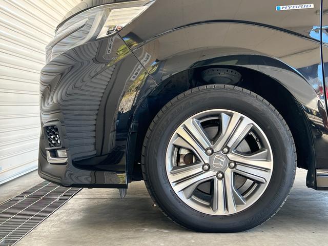 ステップワゴンスパーダ スパーダハイブリッドG・EXホンダセンシング 保証付き1年 フルオートエアコン キーフリー Sヒーター 横滑防止 セキュリティアラーム DVD再生可 パワーウインドウ USB接続 サイドカーテンエアバック エアバッグ クルコン LEDヘッドランプ(59枚目)