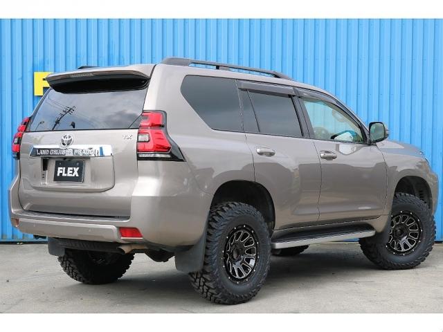 ランドクルーザープラド ＴＸ　アバンギャルドブロンズメタリック　ワンオーナー　新品デルタフォース１７インチＡＷ　新品ジオランダータイヤ　新品２インチリフトアップ　寒冷地仕様　純正９インチナビ　Ｂカメラ　ＥＴＣ　前後ドラレコ（3枚目）
