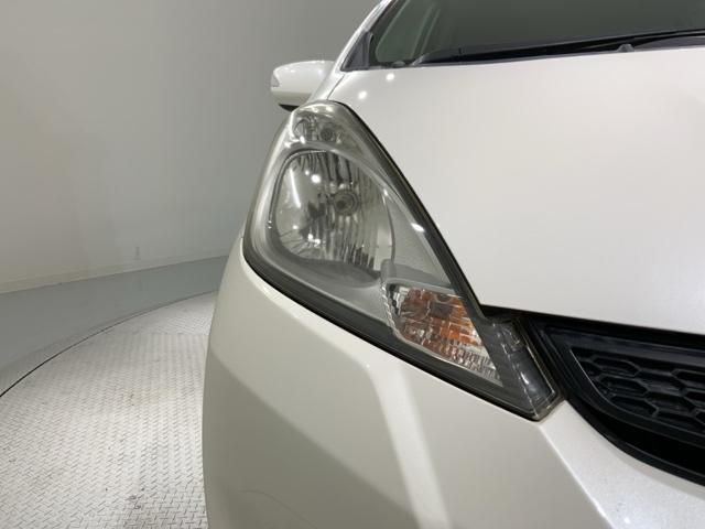 フィット Ｇスマートセレクション　１年保証　ワンオ－ナ－　ナビＶＸＭ－１１８ＶＳ　ＴＶ　Ｒカメラ　音楽機器接続　ＤＶＤ　ＥＴＣ　スマ－トキ－　スペアキ－　盗難防止装置　整備記録簿　Ｗエアバッグ　エアコン　エアバック　Ｗエアーバック（6枚目）