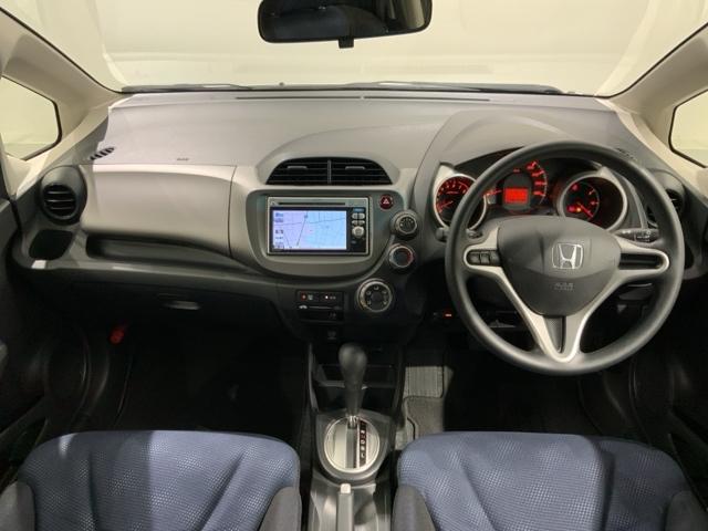 フィット Ｇスマートセレクション　１年保証　ワンオ－ナ－　ナビＶＸＭ－１１８ＶＳ　ＴＶ　Ｒカメラ　音楽機器接続　ＤＶＤ　ＥＴＣ　スマ－トキ－　スペアキ－　盗難防止装置　整備記録簿　Ｗエアバッグ　エアコン　エアバック　Ｗエアーバック（7枚目）