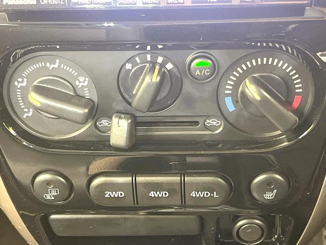 ジムニー ランドベンチャー 禁煙車 SDナビ ETC パートタイム4WD シートヒーター 電動格納ミラー フォグライト 合皮シート プライバシーガラス 純正16インチAW リモコンキー(25枚目)