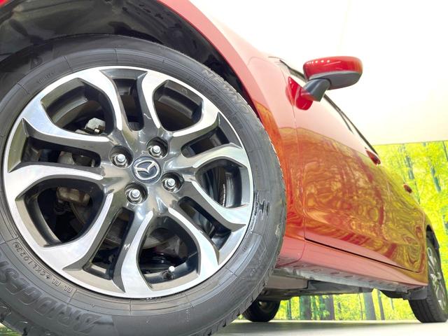 デミオ XDツーリング 禁煙車 純正ナビ スマートブレーキ クルーズコントロール ETC オートエアコン スマートキー DVD/CD/地デジ フォグ オートライト シートリフター アイドリングストップ 電動格納ミラー(12枚目)
