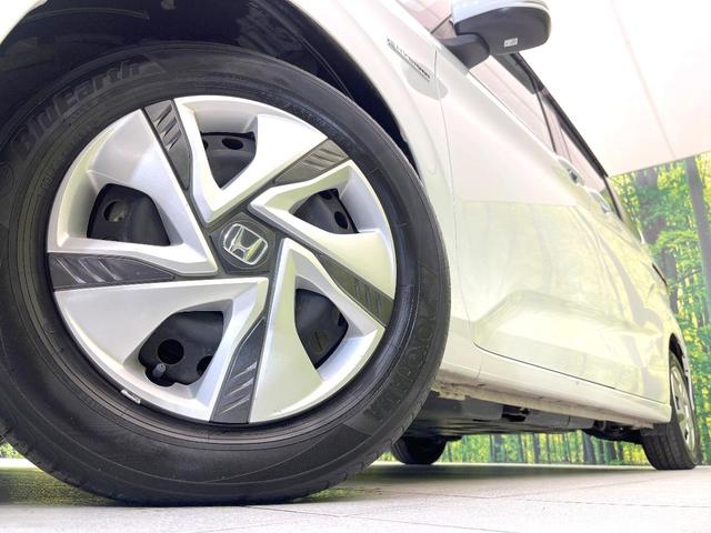 フリードハイブリッド ハイブリッド・Gホンダセンシング 禁煙車 SDナビ バックカメラ 両側電動スライドドア アダプティブクルーズ ドラレコ スマートキー オートエアコン ETC オートライト LEDヘッドライト Bluetooth(14枚目)