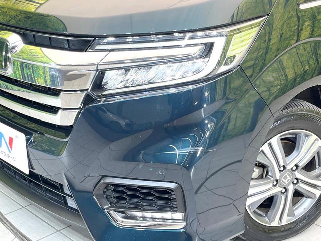 ステップワゴンスパーダ スパーダハイブリッド　Ｇ　ホンダセンシング　禁煙車　純正９型ナビ　バックカメラ　フリップダウン　両側電動スライドドア　アダプティブクルーズ　コーナーセンサー　オートエアコン　ＬＥＤヘッドライト　ＬＥＤフォグライト　スマートキー（13枚目）