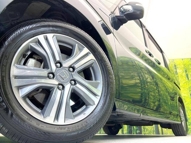 ステップワゴンスパーダ スパーダハイブリッド　Ｇ　ホンダセンシング　禁煙車　純正９型ナビ　バックカメラ　フリップダウン　両側電動スライドドア　アダプティブクルーズ　コーナーセンサー　オートエアコン　ＬＥＤヘッドライト　ＬＥＤフォグライト　スマートキー（14枚目）