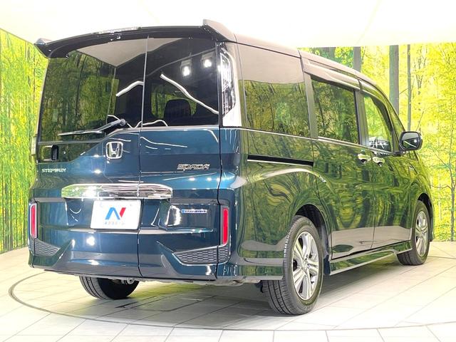 ステップワゴンスパーダ スパーダハイブリッド　Ｇ　ホンダセンシング　禁煙車　純正９型ナビ　バックカメラ　フリップダウン　両側電動スライドドア　アダプティブクルーズ　コーナーセンサー　オートエアコン　ＬＥＤヘッドライト　ＬＥＤフォグライト　スマートキー（18枚目）