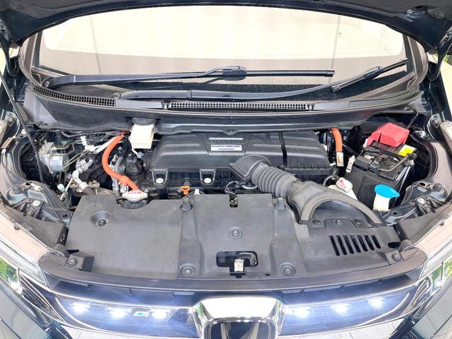 ステップワゴンスパーダ スパーダハイブリッド　Ｇ　ホンダセンシング　禁煙車　純正９型ナビ　バックカメラ　フリップダウン　両側電動スライドドア　アダプティブクルーズ　コーナーセンサー　オートエアコン　ＬＥＤヘッドライト　ＬＥＤフォグライト　スマートキー（19枚目）