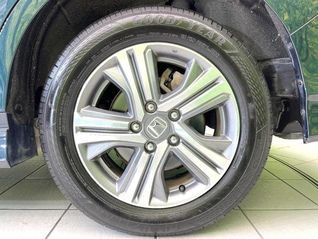 ステップワゴンスパーダ スパーダハイブリッド　Ｇ　ホンダセンシング　禁煙車　純正９型ナビ　バックカメラ　フリップダウン　両側電動スライドドア　アダプティブクルーズ　コーナーセンサー　オートエアコン　ＬＥＤヘッドライト　ＬＥＤフォグライト　スマートキー（72枚目）