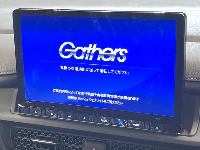 ステップワゴン ｅ：ＨＥＶスパーダ　登録済未使用車　純正１１．４型ナビ　バックモニター　ホンダセンシング　両側パワスラ　ＢＳＭ　レーダークルーズ　オットマンシート　リアオートエアコン　オートエアコン　シートヒーター　パワーバックドア（3枚目）