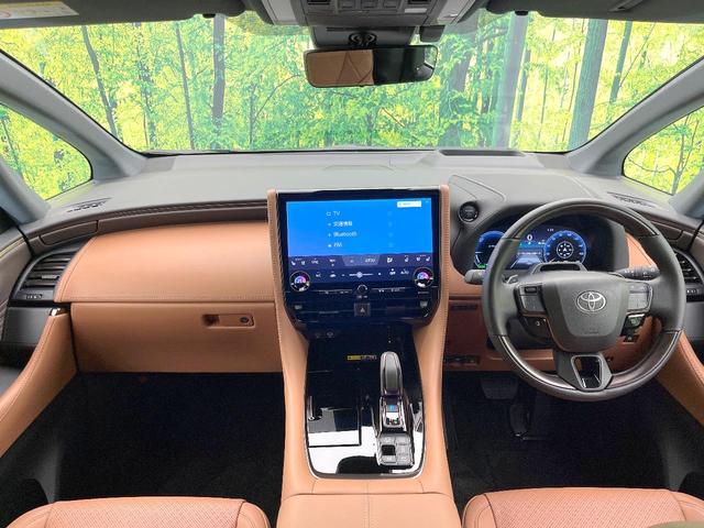 ヴェルファイアハイブリッド Ｚ　プレミア　禁煙車　純正１４型ナビ　フリップダウンモニター　全方位モニター　デジタルミラー　左右独立ムーンルーフ　ユニバーサルステップ　ＢＳＭ　セーフティセンス　レーダークルーズ　シートヒーター　ベンチレーション（2枚目）