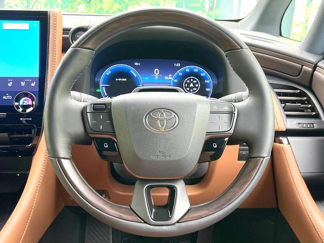 ヴェルファイアハイブリッド Ｚ　プレミア　禁煙車　純正１４型ナビ　フリップダウンモニター　全方位モニター　デジタルミラー　左右独立ムーンルーフ　ユニバーサルステップ　ＢＳＭ　セーフティセンス　レーダークルーズ　シートヒーター　ベンチレーション（12枚目）