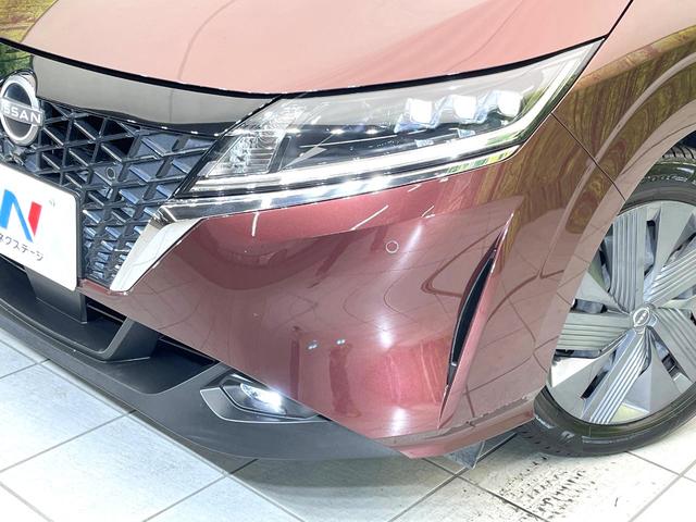 ノート Ｘ　禁煙車　純正９型ナビ　全方位モニター　プロパイロット　デジタルミラー　エマージェンシーブレーキ　ＢＳＭ　ＥＴＣ　ドラレコ　スマートキー　置くだけ充電　シートリフター　オートエアコン　オートライト（12枚目）