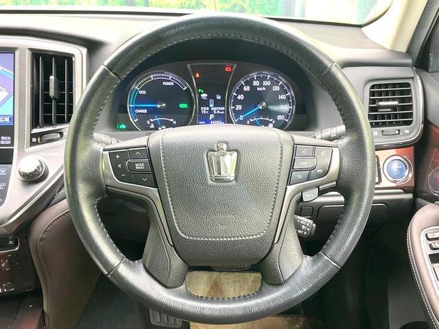 クラウンハイブリッド ロイヤルサルーン　禁煙車　純正８型ＨＤＤナビ　バックモニター　レーダークルーズコンロトロール　クリアランスソナー　パワーシート　ＥＴＣ　スマートキー　ＨＩＤヘッド　オートライト　フォグ　電動格納ミラー　バニティミラー（11枚目）