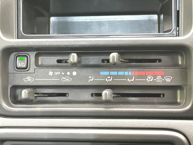 ハイゼットカーゴ デッキバンＧ　禁煙車　オーディオ　ＭＴ車　ドラレコ　ヘッドライトレベライザー　プライバシーガラス　スライドドア　パワーウィンドウ　ドアポケット（5枚目）