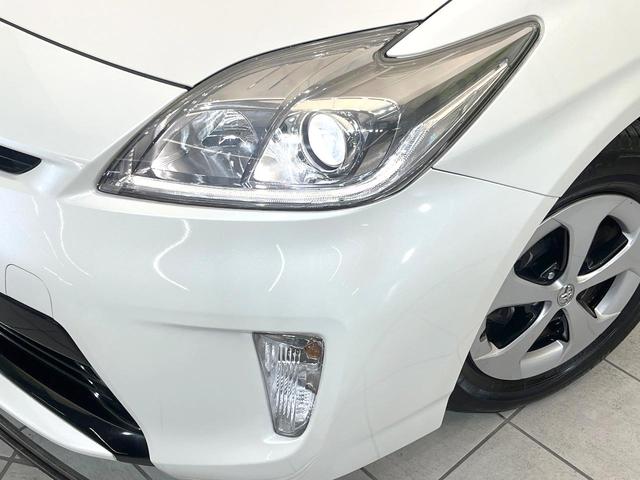 プリウス Ｓ　禁煙車　純正ナビ　バックモニター　オートエアコン　ＥＴＣ　スマートキー　シートリフター　電動格納ミラー　ＨＩＤヘッド　オートライト　ステアリングスイッチ　Ｂｌｕｅｔｏｏｔｈ　フォグ（12枚目）