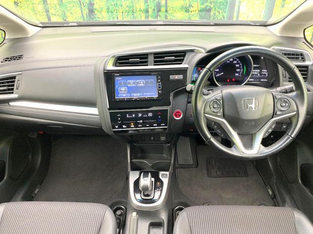 フィットハイブリッド L ホンダセンシング 禁煙車 純正ナビ バックモニター ホンダセンシング レーダークルーズ ETC ドラレコ オートエアコン スマートキー ハーフレザーシート LEDヘッド フォグ オートライト シートリフター(2枚目)