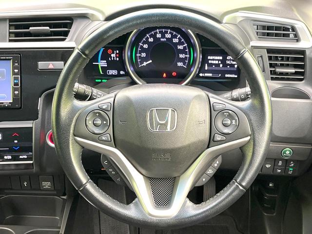 フィットハイブリッド L ホンダセンシング 禁煙車 純正ナビ バックモニター ホンダセンシング レーダークルーズ ETC ドラレコ オートエアコン スマートキー ハーフレザーシート LEDヘッド フォグ オートライト シートリフター(11枚目)