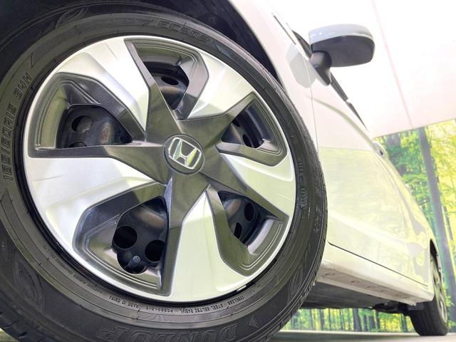 フィットハイブリッド L ホンダセンシング 禁煙車 純正ナビ バックモニター ホンダセンシング レーダークルーズ ETC ドラレコ オートエアコン スマートキー ハーフレザーシート LEDヘッド フォグ オートライト シートリフター(13枚目)