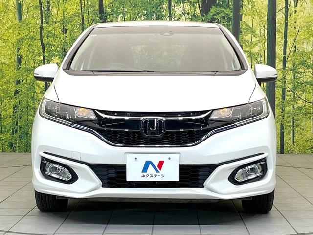 フィットハイブリッド L ホンダセンシング 禁煙車 純正ナビ バックモニター ホンダセンシング レーダークルーズ ETC ドラレコ オートエアコン スマートキー ハーフレザーシート LEDヘッド フォグ オートライト シートリフター(14枚目)