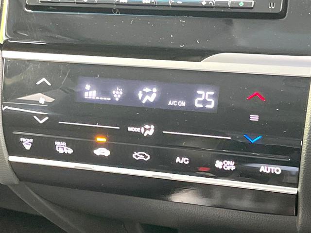 フィットハイブリッド L ホンダセンシング 禁煙車 純正ナビ バックモニター ホンダセンシング レーダークルーズ ETC ドラレコ オートエアコン スマートキー ハーフレザーシート LEDヘッド フォグ オートライト シートリフター(25枚目)