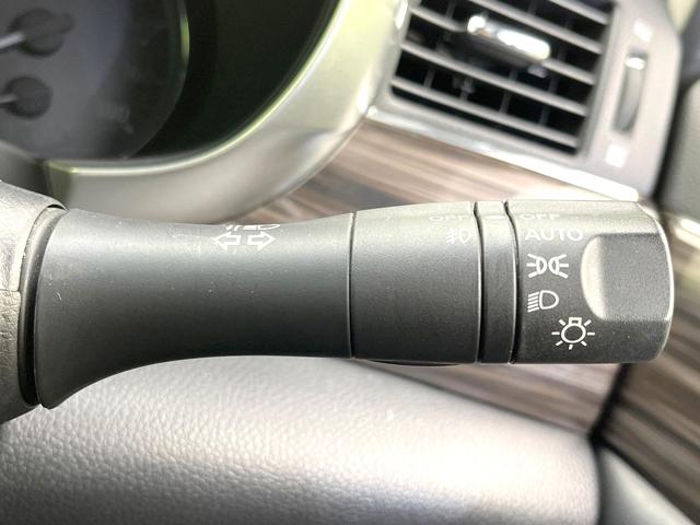 エルグランド 250ハイウェイスターS 禁煙車 純正ナビ フリップダウンモニター 全方位モニター 両側パワスラ オットマンシート クルコン ETC オートエアコン リアオートエアコン スマートキー シートリフター 電動格納ミラー(40枚目)