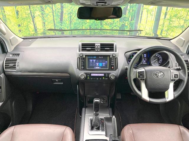 ランドクルーザープラド TX Lパッケージ・G-フロンティア 禁煙車 メーカーナビ フロント・サイド・バックカメラ クルコン パワーシート 赤茶レザーシート 3列シート ETC LEDヘッド ヘッドライトウォッシャー オートライト オートエアコン スマートキー(2枚目)