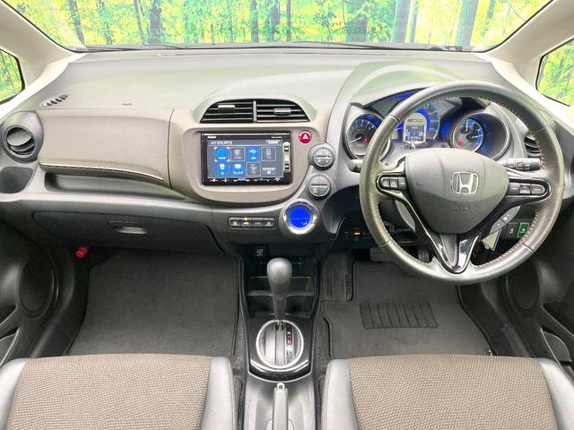 フィットシャトルハイブリッド ハイブリッド　禁煙車　純正ナビ　バックモニター　クルコン　ＥＴＣ　ドラレコ　リモコンキー　オートエアコン　ハーフレザーシート　シートリフター　電動格納ミラー　ヘッドライトレベライザー　バニティミラー（2枚目）