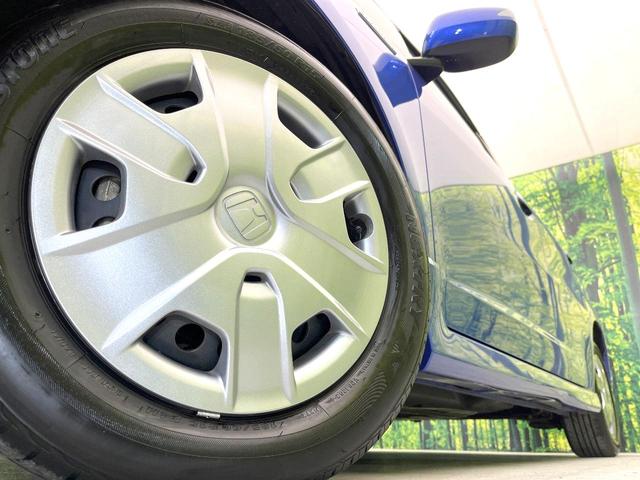 フィットシャトルハイブリッド ハイブリッド　禁煙車　純正ナビ　バックモニター　クルコン　ＥＴＣ　ドラレコ　リモコンキー　オートエアコン　ハーフレザーシート　シートリフター　電動格納ミラー　ヘッドライトレベライザー　バニティミラー（13枚目）