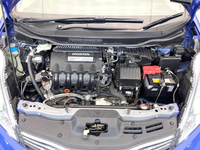 フィットシャトルハイブリッド ハイブリッド　禁煙車　純正ナビ　バックモニター　クルコン　ＥＴＣ　ドラレコ　リモコンキー　オートエアコン　ハーフレザーシート　シートリフター　電動格納ミラー　ヘッドライトレベライザー　バニティミラー（18枚目）