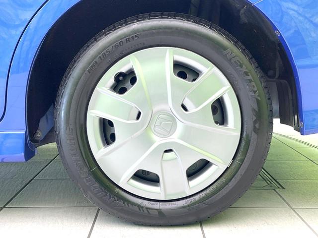 フィットシャトルハイブリッド ハイブリッド　禁煙車　純正ナビ　バックモニター　クルコン　ＥＴＣ　ドラレコ　リモコンキー　オートエアコン　ハーフレザーシート　シートリフター　電動格納ミラー　ヘッドライトレベライザー　バニティミラー（62枚目）