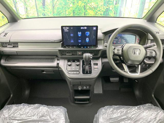 ステップワゴン スパーダ　登録済未使用車　純正１１型ナビ　バックモニター　ホンダセンシング　レーダークルーズ　ＢＳＭ　両側パワスラ　パワーバックドア　シートヒーター　オートエアコン　リアオートエアコン　ハーフレザーシート（2枚目）
