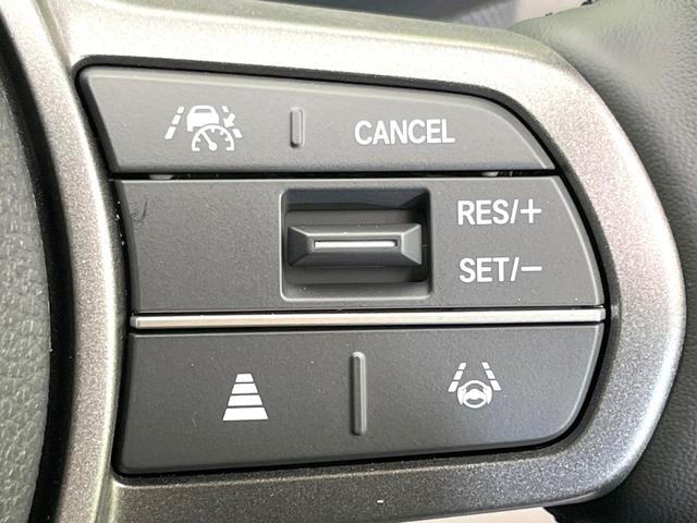 フリード エアー　ＥＸ　登録済未使用車　ホンダセンシング　レーダークルーズ　両側パワスラ　シートヒーター　オートエアコン　ＬＥＤヘッド　オートライト　リアクーラー　シートバックポケット　バニティミラー　電動格納ミラー（4枚目）