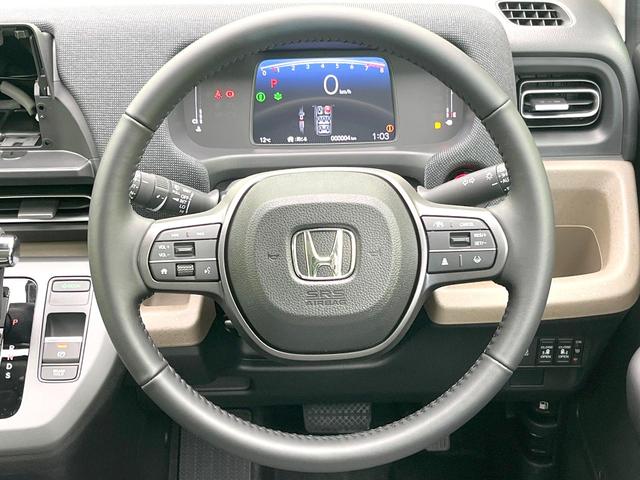 フリード エアー　ＥＸ　登録済未使用車　ホンダセンシング　レーダークルーズ　両側パワスラ　シートヒーター　オートエアコン　ＬＥＤヘッド　オートライト　リアクーラー　シートバックポケット　バニティミラー　電動格納ミラー（12枚目）