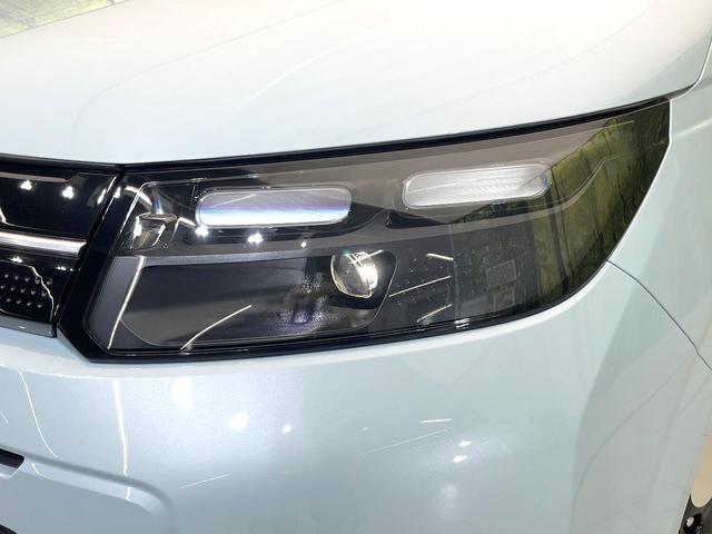 フリード エアー　ＥＸ　登録済未使用車　ホンダセンシング　レーダークルーズ　両側パワスラ　シートヒーター　オートエアコン　ＬＥＤヘッド　オートライト　リアクーラー　シートバックポケット　バニティミラー　電動格納ミラー（13枚目）