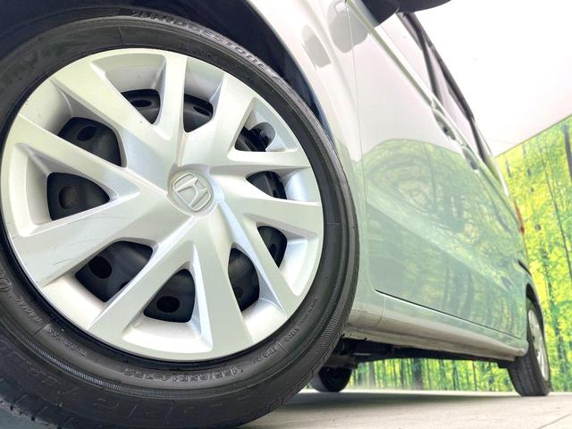 N-BOX G・Lターボホンダセンシング 禁煙車 純正ナビ バックモニター ホンダセンシング レーダークルーズ 両側パワスラ ETC オートエアコン パドルシフト ターボ LEDヘッド オートライト スマートキー シートリフター(13枚目)