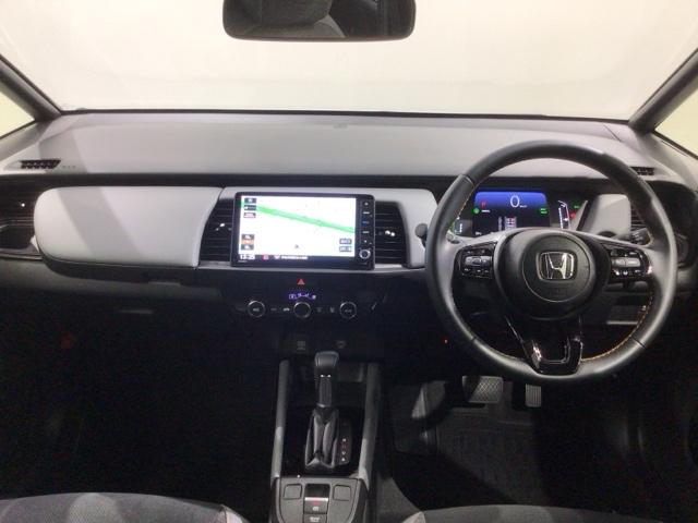 フィット e:HEVRS HSENSING 新車保証 試乗車 ワンオ-ナ- エアバッグ ナビ&TV パワーウィンドウ 助手席エアバッグ Dレコ フルセグテレビ LEDヘッドランプ セキュリティアラーム フルオートエアコン(9枚目)