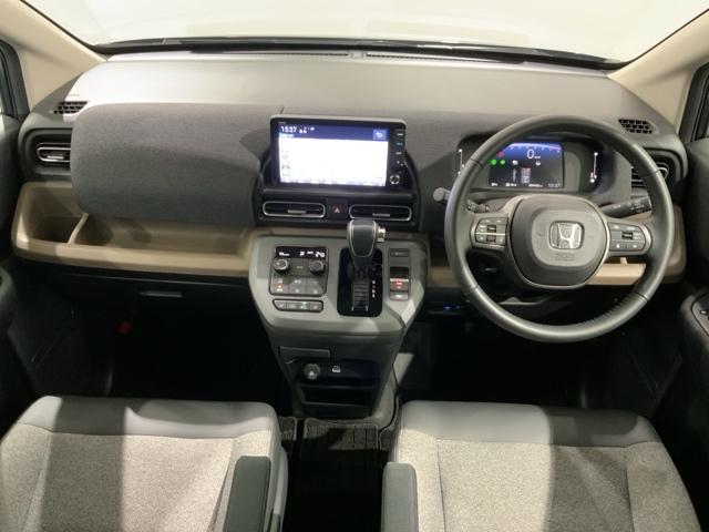 フリード エアーＥＸ　Ｈ　ＳＥＮＳＩＮＧ　新車保証　試乗車　ワンオ－ナ－　ナビＬＸＵ－２４２ＶＦＮｉ　Ｒカメラ　ＢＴオ－ディオ　ＥＴＣ　ＬＥＤライト　両側電動ドア　ＶＳＡ　シ－トヒ－タ－　クルコン　アルミ　スマ－トキ－（9枚目）