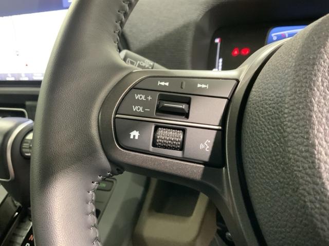 フリード エアーＥＸ　Ｈ　ＳＥＮＳＩＮＧ　新車保証　試乗車　ワンオ－ナ－　ナビＬＸＵ－２４２ＶＦＮｉ　Ｒカメラ　ＢＴオ－ディオ　ＥＴＣ　ＬＥＤライト　両側電動ドア　ＶＳＡ　シ－トヒ－タ－　クルコン　アルミ　スマ－トキ－（11枚目）