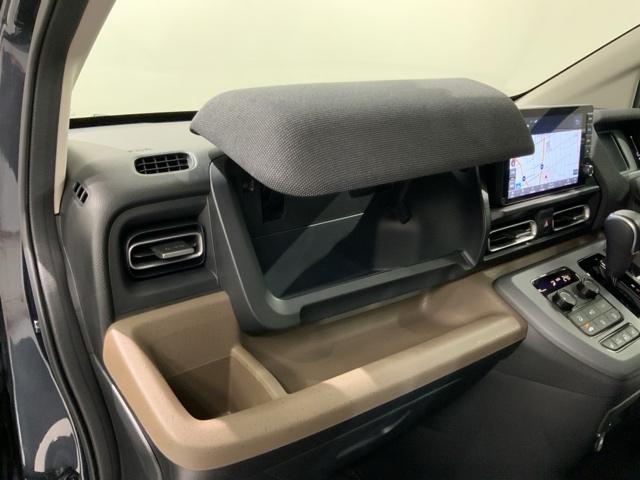 フリード エアーＥＸ　Ｈ　ＳＥＮＳＩＮＧ　新車保証　試乗車　ワンオ－ナ－　ナビＬＸＵ－２４２ＶＦＮｉ　Ｒカメラ　ＢＴオ－ディオ　ＥＴＣ　ＬＥＤライト　両側電動ドア　ＶＳＡ　シ－トヒ－タ－　クルコン　アルミ　スマ－トキ－（24枚目）