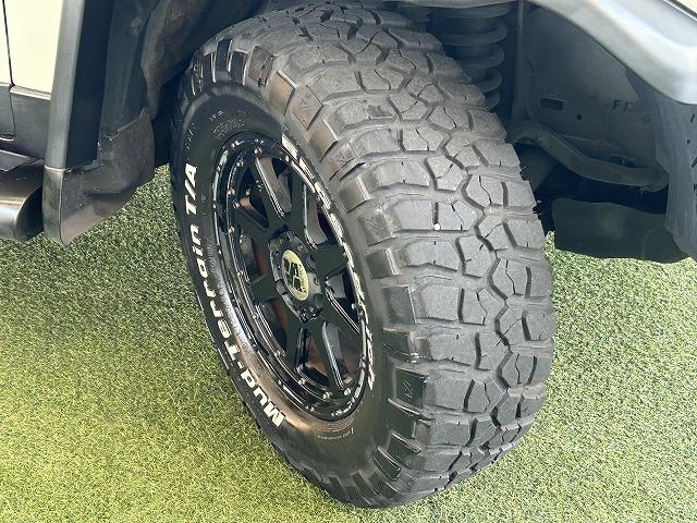 カラ－パッケージ　４ＷＤ　デフロック　１７インチエクストリームＪアルミホイール　ＢＦグッドリッチタイヤ　クルーズコントロール　７型ナビ　バックカメラ　ＥＴＣ　ＩＳＯＦＩＸ　マニュアルエアコン　クリアランスソナーソナー(29枚目)