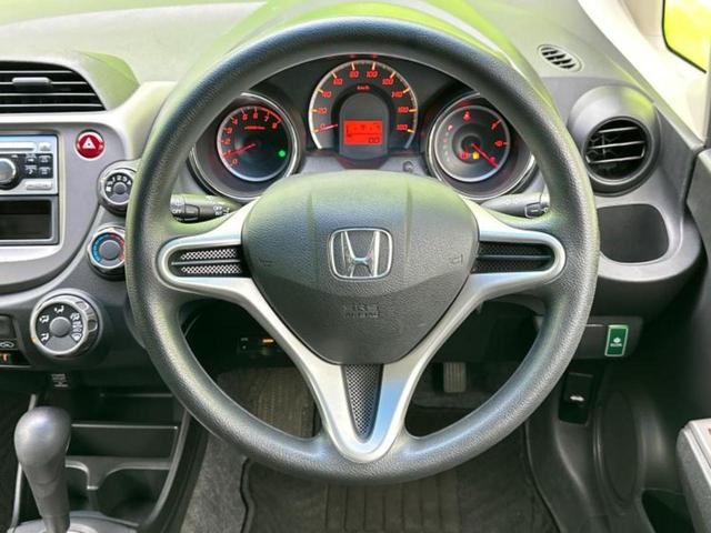 フィット １３Ｇ・１０ｔｈアニバーサリー　新品タイヤ／保証書／ＥＴＣ／ＥＢＤ付ＡＢＳ／エアバッグ　運転席／エアバッグ　助手席／パワーウインドウ／キーレススタート／パワーステアリング／オートライト／盗難防止システム／マニュアルエアコン（10枚目）